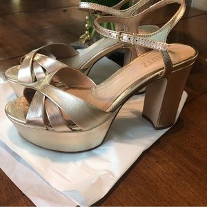 Schutz, gold leather comfortable, almost new, amazing heels, US 7